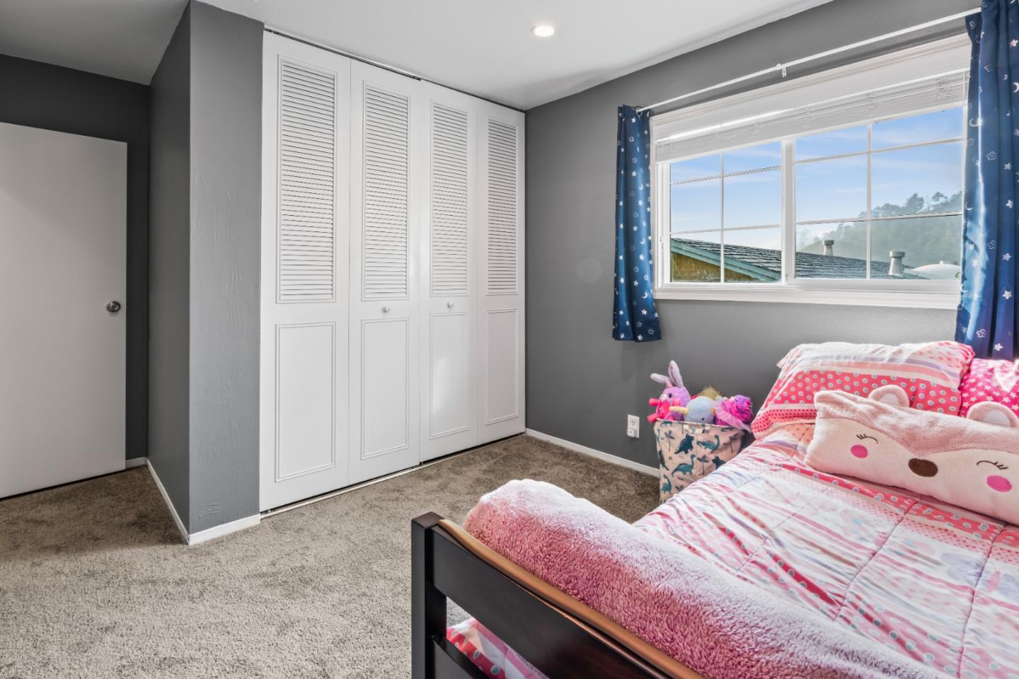 804 Prairie Creek Drive Pacifica, CA 94044 - Photo 18 of 64 a bedroom with a bed dresser and window