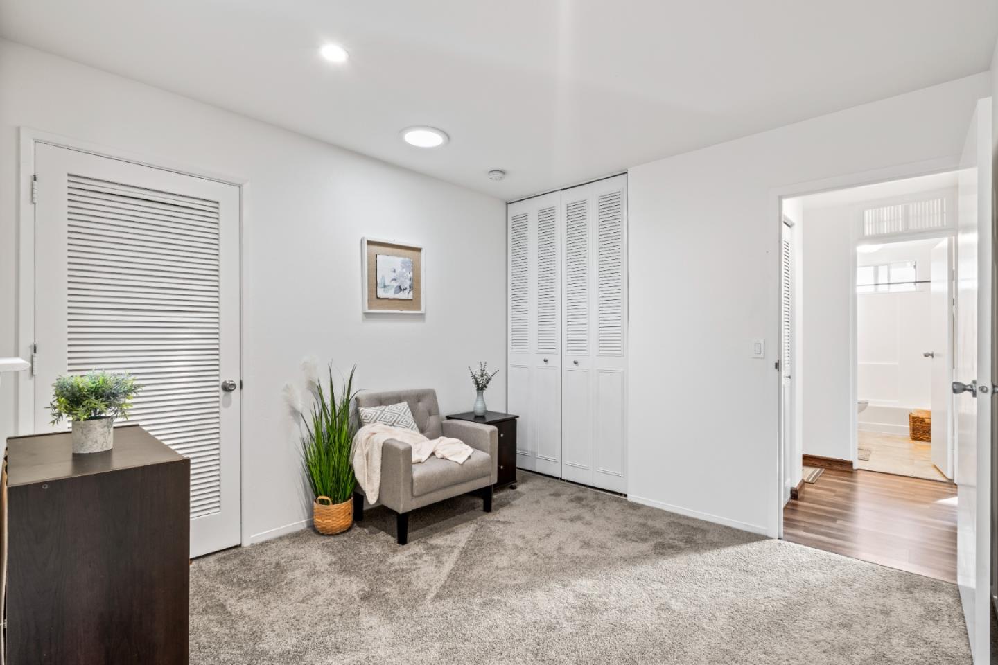 804 Prairie Creek Drive Pacifica, CA 94044 - Photo 24 of 64 a living room with furniture and wooden floor
