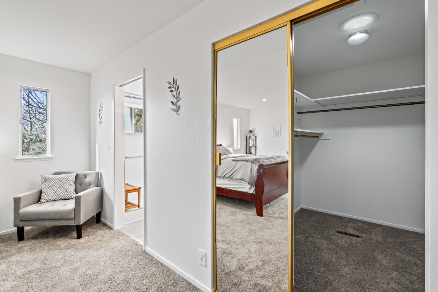 804 Prairie Creek Drive Pacifica, CA 94044 - Photo 25 of 64 a bedroom with a bed and a couch