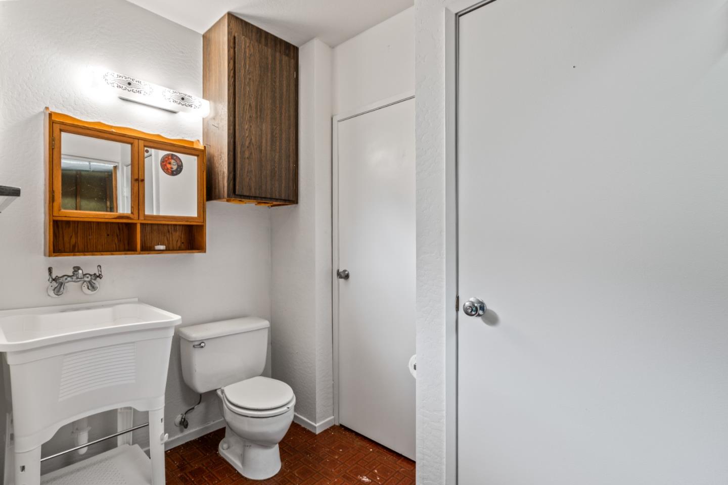 804 Prairie Creek Drive Pacifica, CA 94044 - Photo 41 of 64 a bathroom with a toilet sink and shower