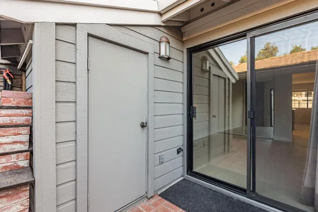 a front view of a building with an outdoor space