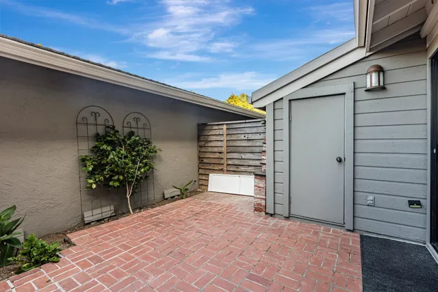 a view of a house with a door and a outdoor space