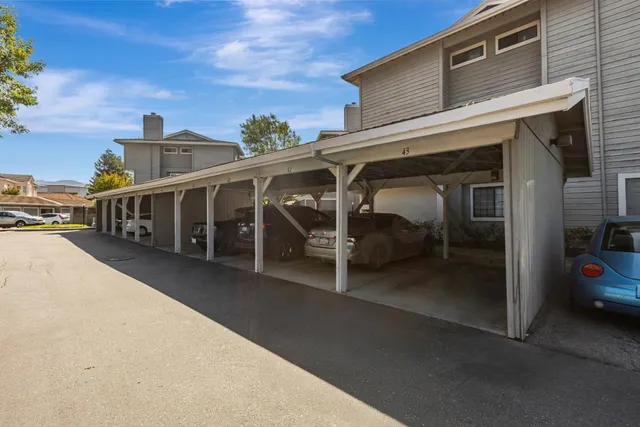 a view of balcony with wooden floor