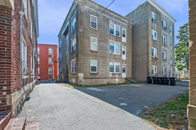 a view of a building with a street