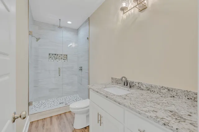 a view of a kitchen from the hallway