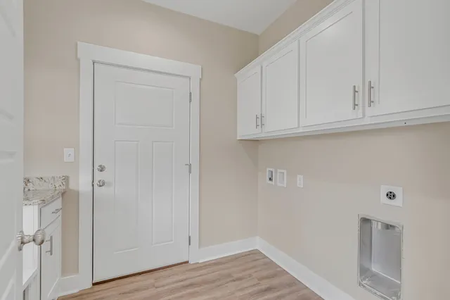 a view of an empty room with a balcony