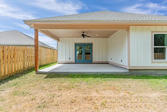 a view of backyard and tree