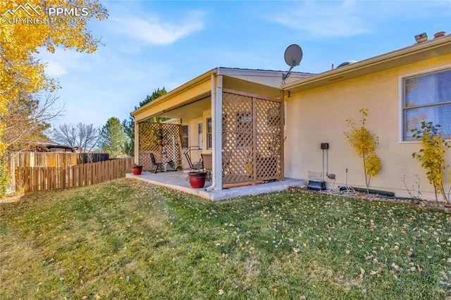 a view of a backyard with garden