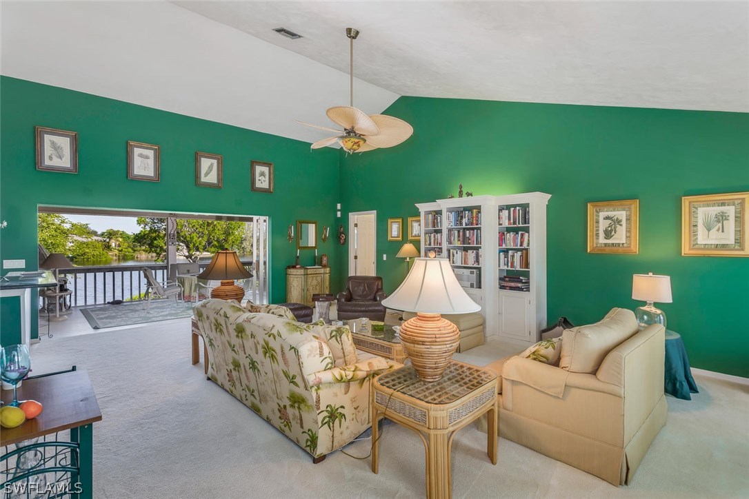 1341 Sand Castle Road Sanibel, FL 33957 - Photo 4 of 18 a living room with furniture kitchen view and a large window