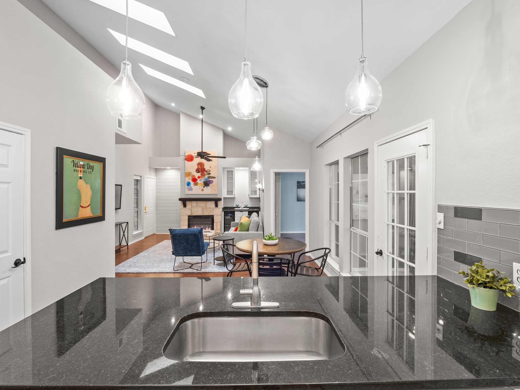 3809 Spicewood Springs Road, Unit 137 Austin, TX 78759 - Photo 34 of 34 An open floorplan with vaulted ceilings make the kitchen and dining area completely open to the living area.