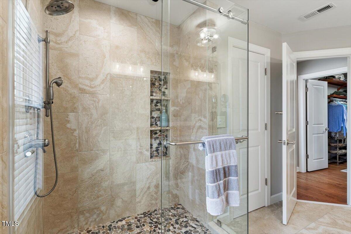 105 Sunstone Drive Cary, NC 27519 - Photo 17 of 25 a bathroom with a shower