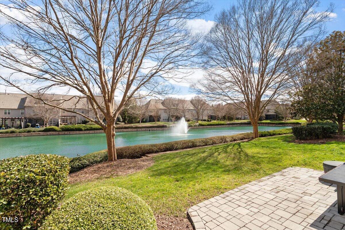 105 Sunstone Drive Cary, NC 27519 - Photo 24 of 25 a view of a lake with houses