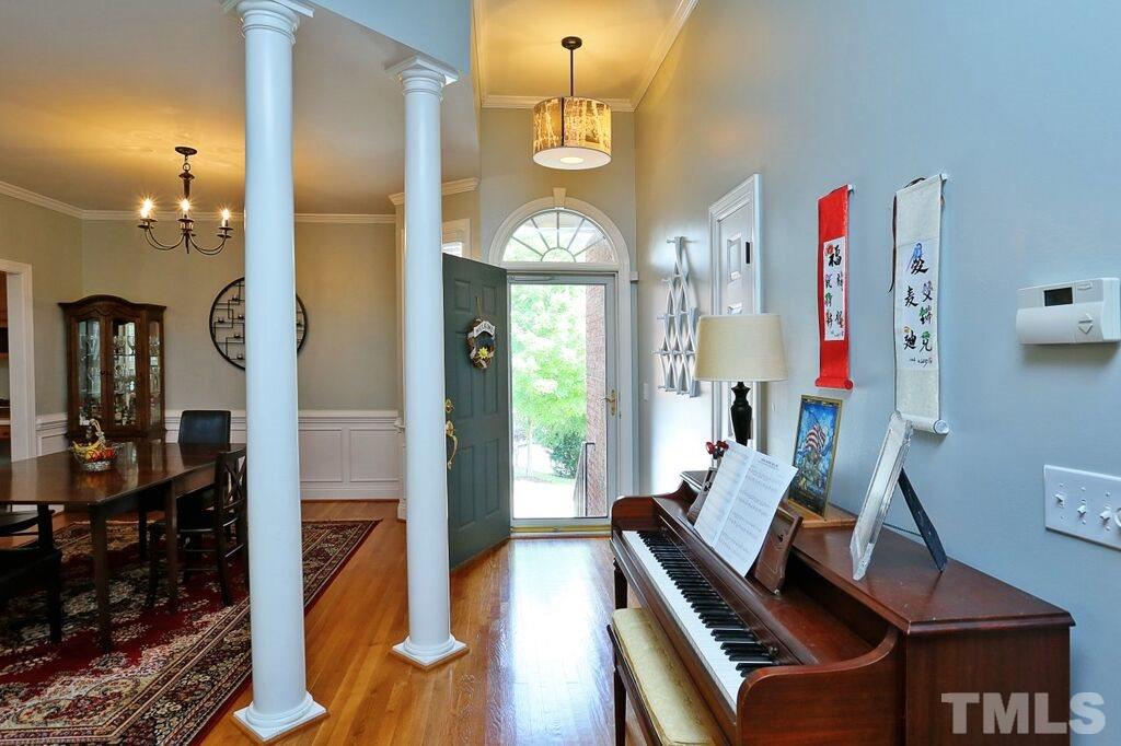 6301 Pleasant Creek Court Raleigh, NC 27613 - Photo 2 of 21 a very nice looking room with many windows and furniture