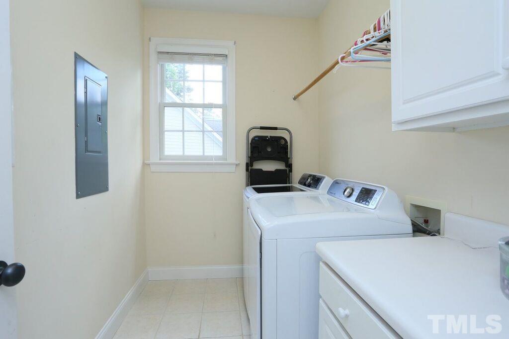 6301 Pleasant Creek Court Raleigh, NC 27613 - Photo 15 of 21 a utility room with dryer and washer