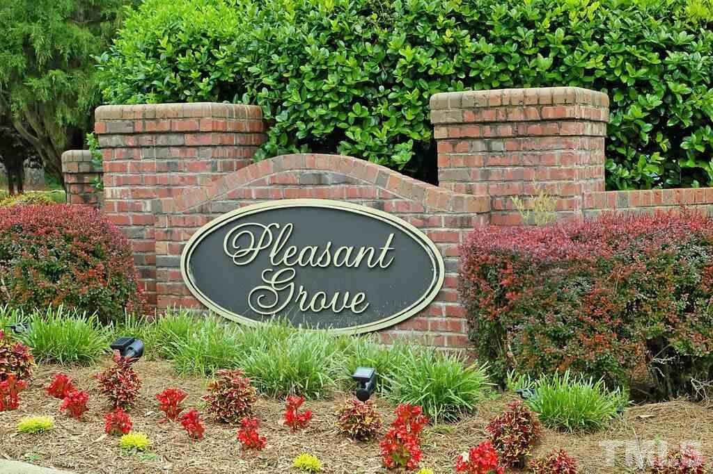 6301 Pleasant Creek Court Raleigh, NC 27613 - Photo 21 of 21 a sign on the side of a building