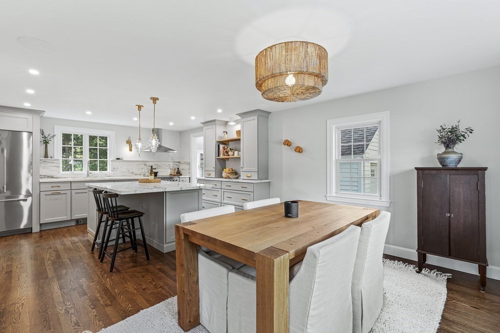49 Ripley Road Medford, MA 02155 - Photo 14 of 39 a kitchen with a table and chairs in it