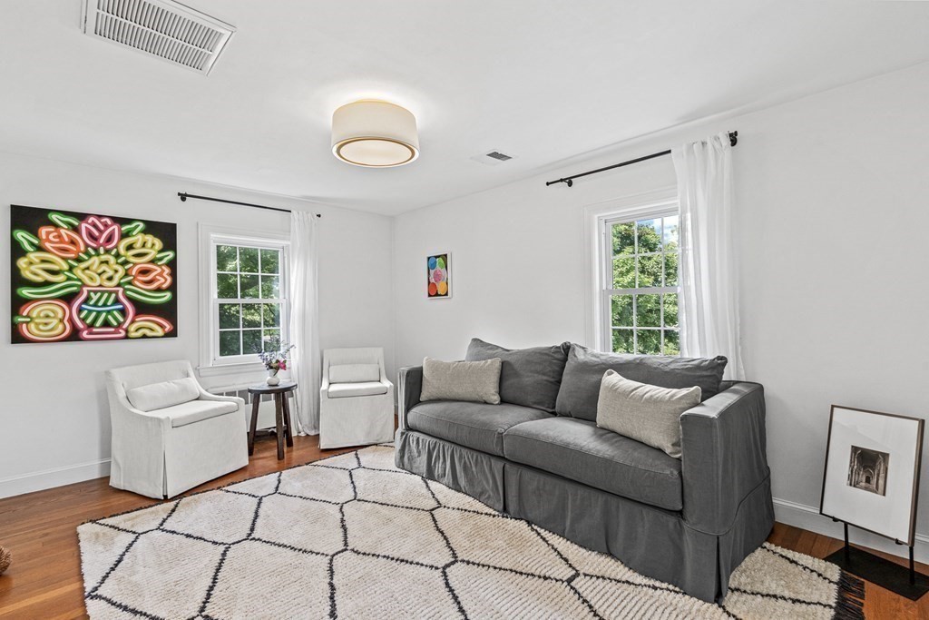 49 Ripley Road Medford, MA 02155 - Photo 20 of 39 a living room with furniture and a window