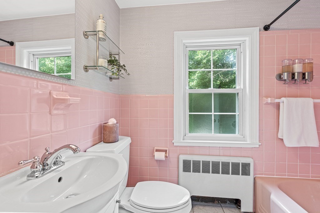 49 Ripley Road Medford, MA 02155 - Photo 21 of 39 a bathroom with a sink toilet and window