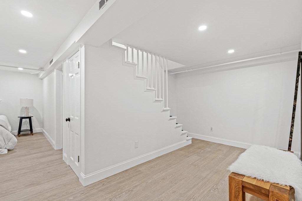 49 Ripley Road Medford, MA 02155 - Photo 22 of 39 wooden floor in an empty room with a window