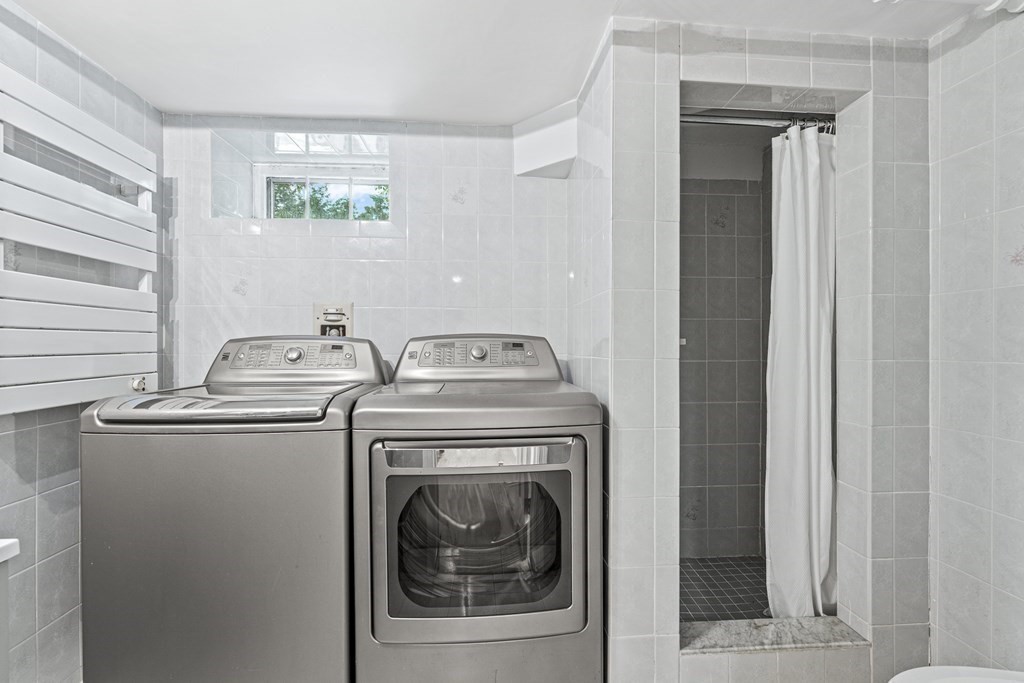 49 Ripley Road Medford, MA 02155 - Photo 28 of 39 a utility room with dryer and washer