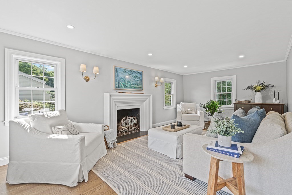 49 Ripley Road Medford, MA 02155 - Photo 4 of 39 a living room with furniture and a fireplace