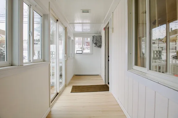 a view of a bathroom from the hallway