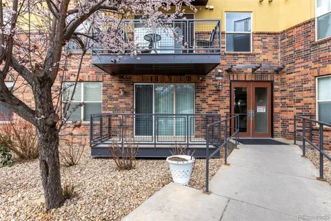 a front view of a building with patio