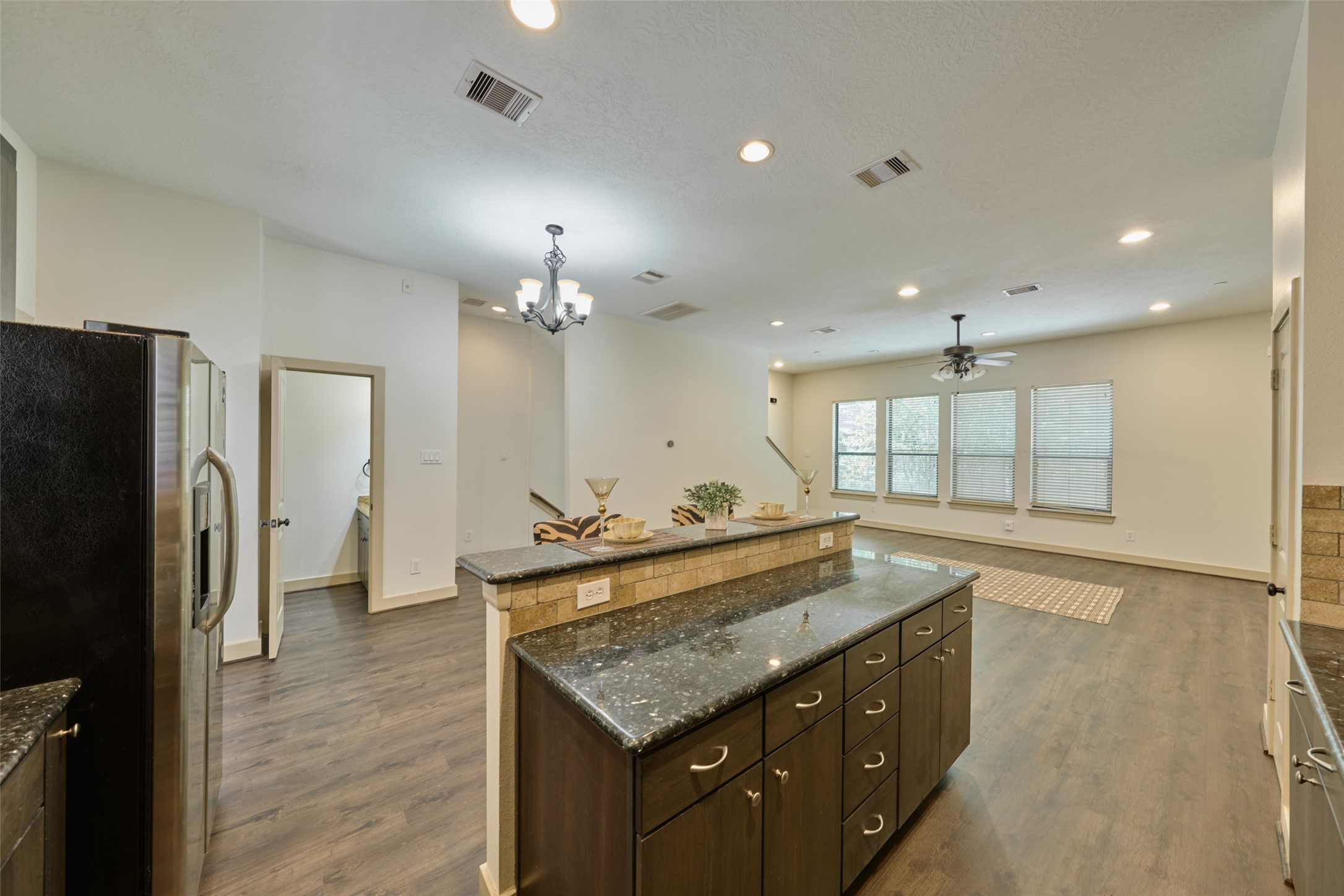 2422 Navigation Boulevard, Unit E Houston, TX 77003 - Photo 18 of 29 a spacious kitchen with a sink and a refrigerator