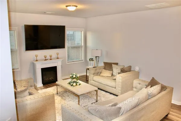 a living room with furniture and a couch