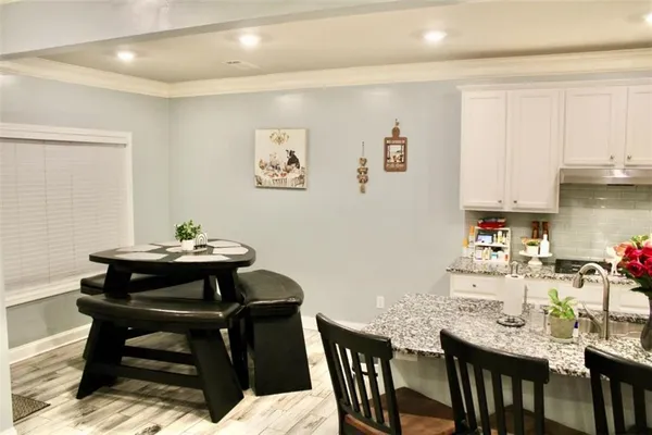 a view of a dining room with furniture