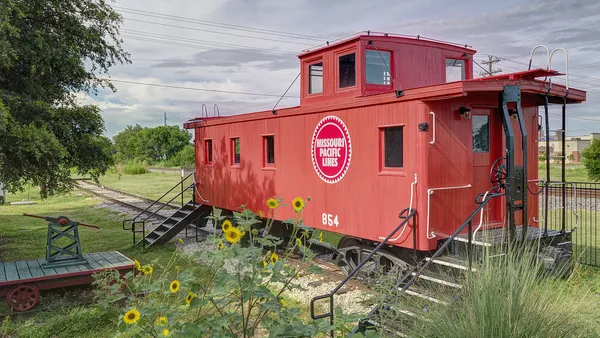 swimming pool with red umbrella