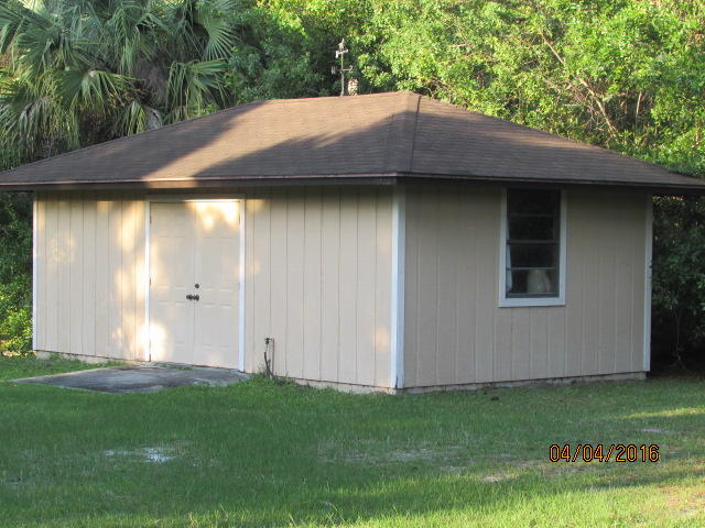 8720 Hidden Pines Road Fort Pierce, FL 34945 - Photo 25 of 31 25 work shop