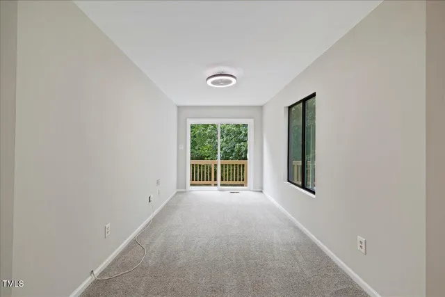 a bathroom with a toilet sink and shower