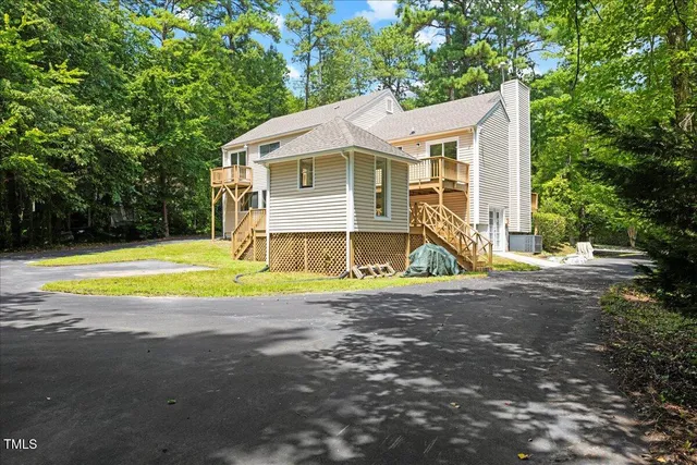 a aerial view of a house with a deck