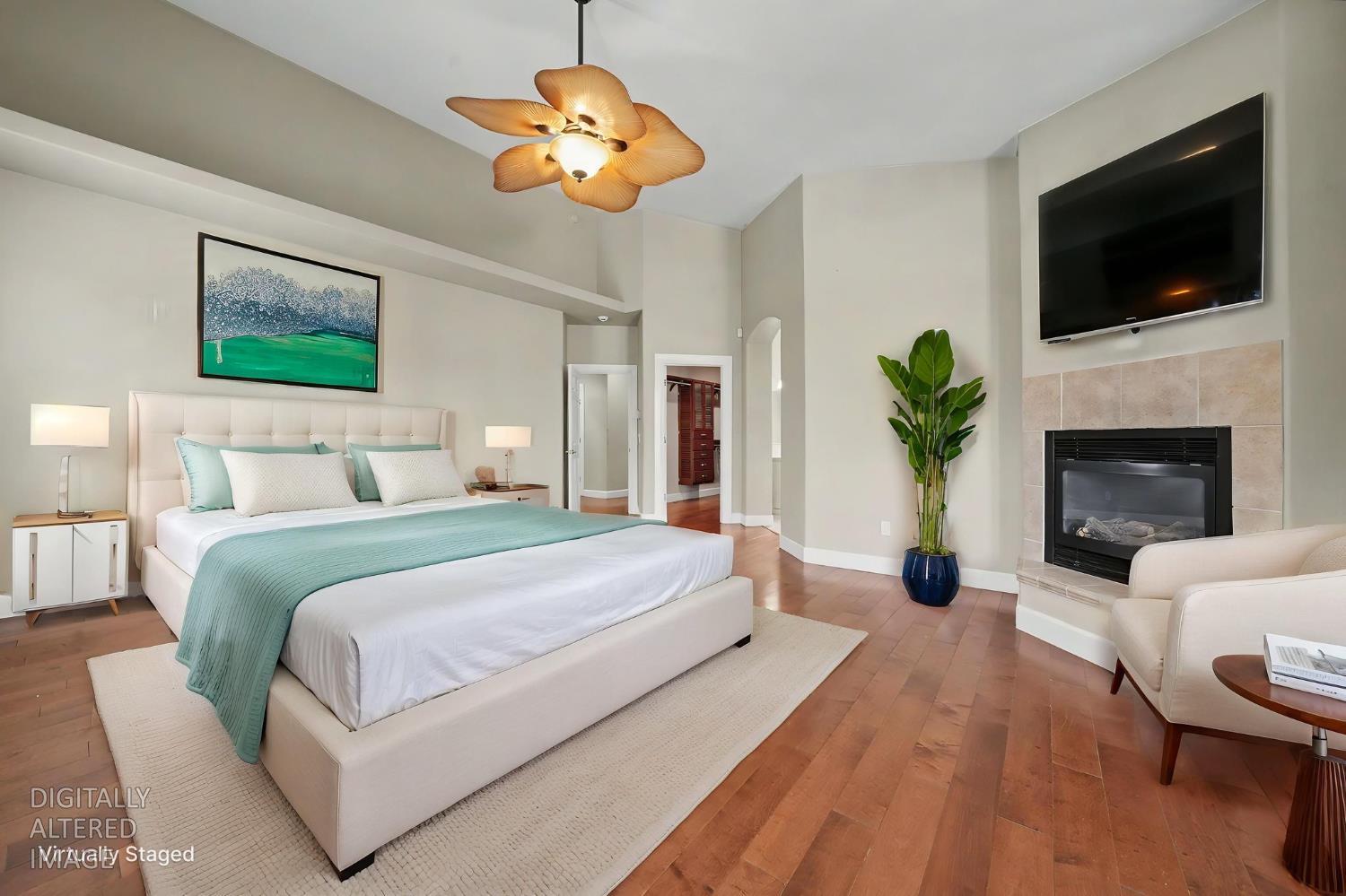 532 Oakridge Road Valley Springs, CA 95252 - Photo 50 of 89 a bedroom with a large bed and a flat screen tv