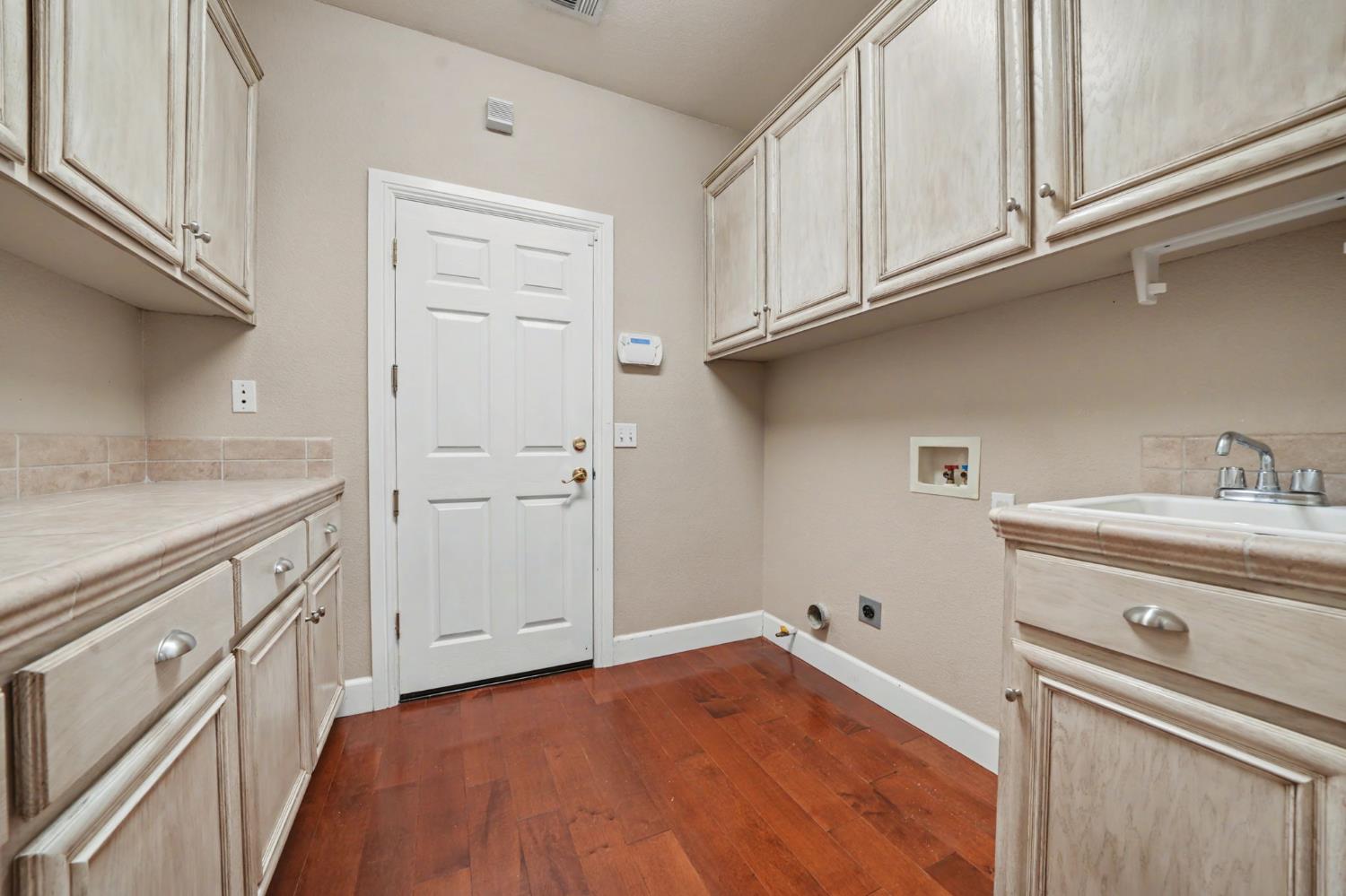 532 Oakridge Road Valley Springs, CA 95252 - Photo 62 of 89 a view of a kitchen with cabinets
