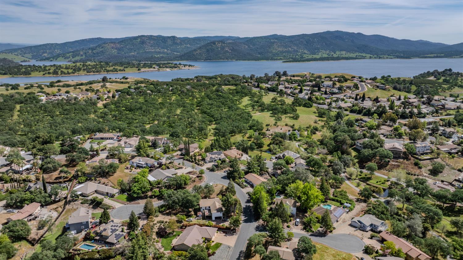 532 Oakridge Road Valley Springs, CA 95252 - Photo 78 of 89 an aerial view of residential houses with outdoor space and mountain view