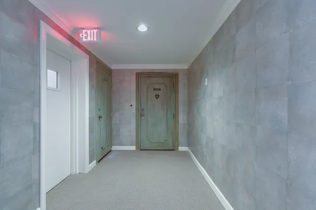a kitchen with stainless steel appliances granite countertop a sink and dishwasher with wooden cabinets