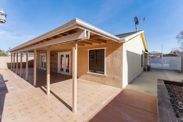 a front view of a house with stairs