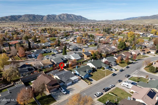an aerial view of a city with lots of residential buildings