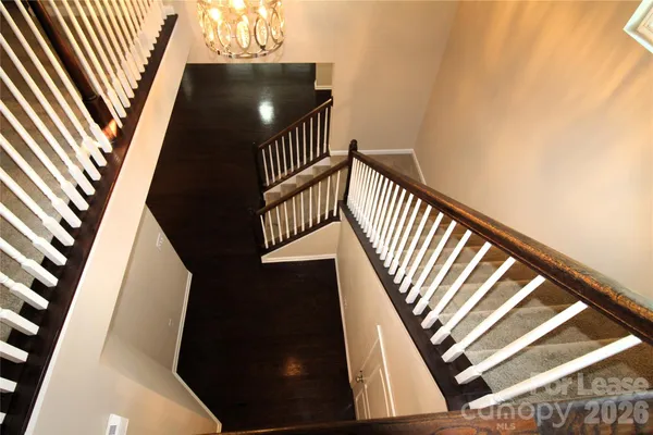 a view of a hallway with windows