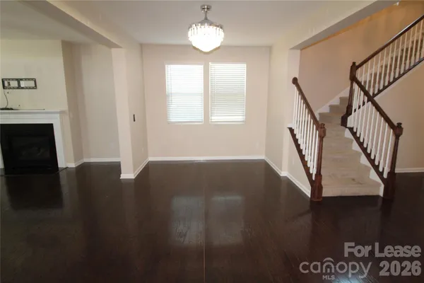 a view of entryway with wooden floor