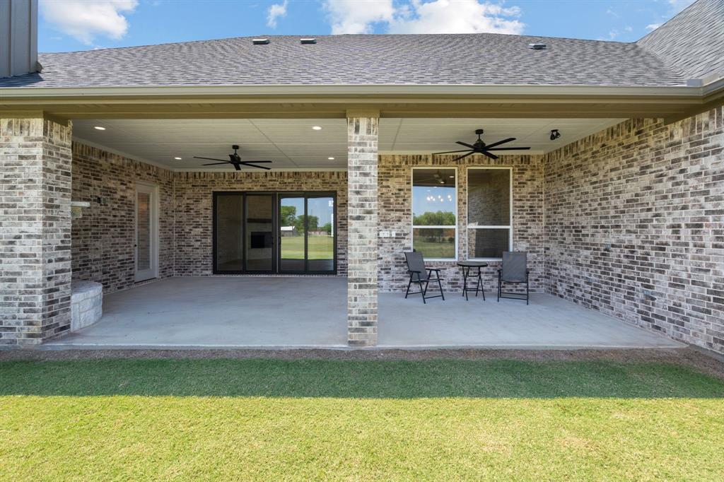 161 Frontera Drive Decatur, TX 76234 - Photo 33 of 39 Covered Patio, Fireplace & Plenty of Outdoor Cooking Space