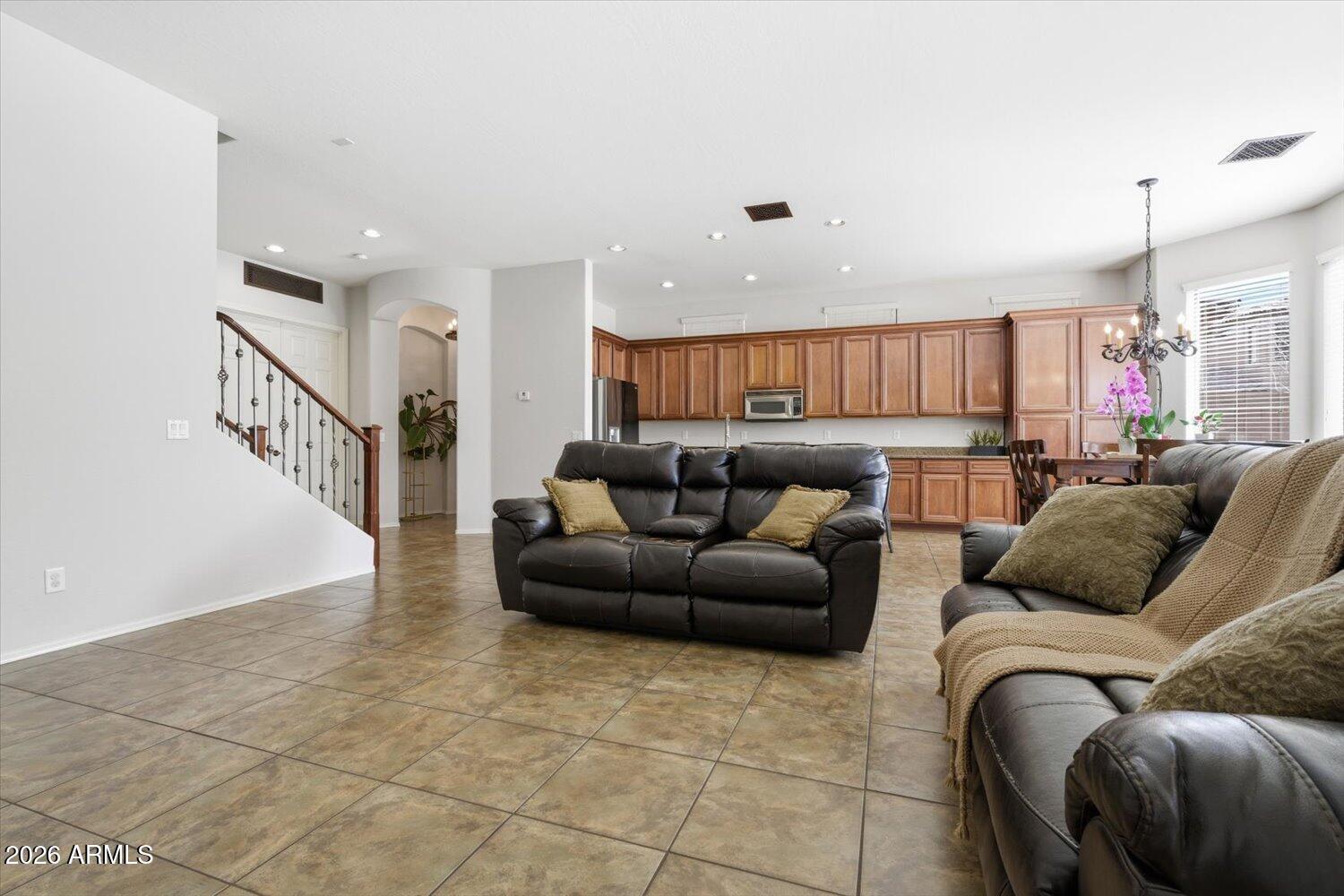 7253 East Nathan Street Mesa, AZ 85207 - Photo 10 of 34 a living room with furniture and a view of kitchen