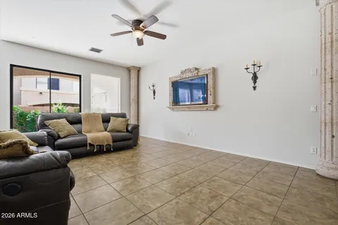 a living room with furniture and a window