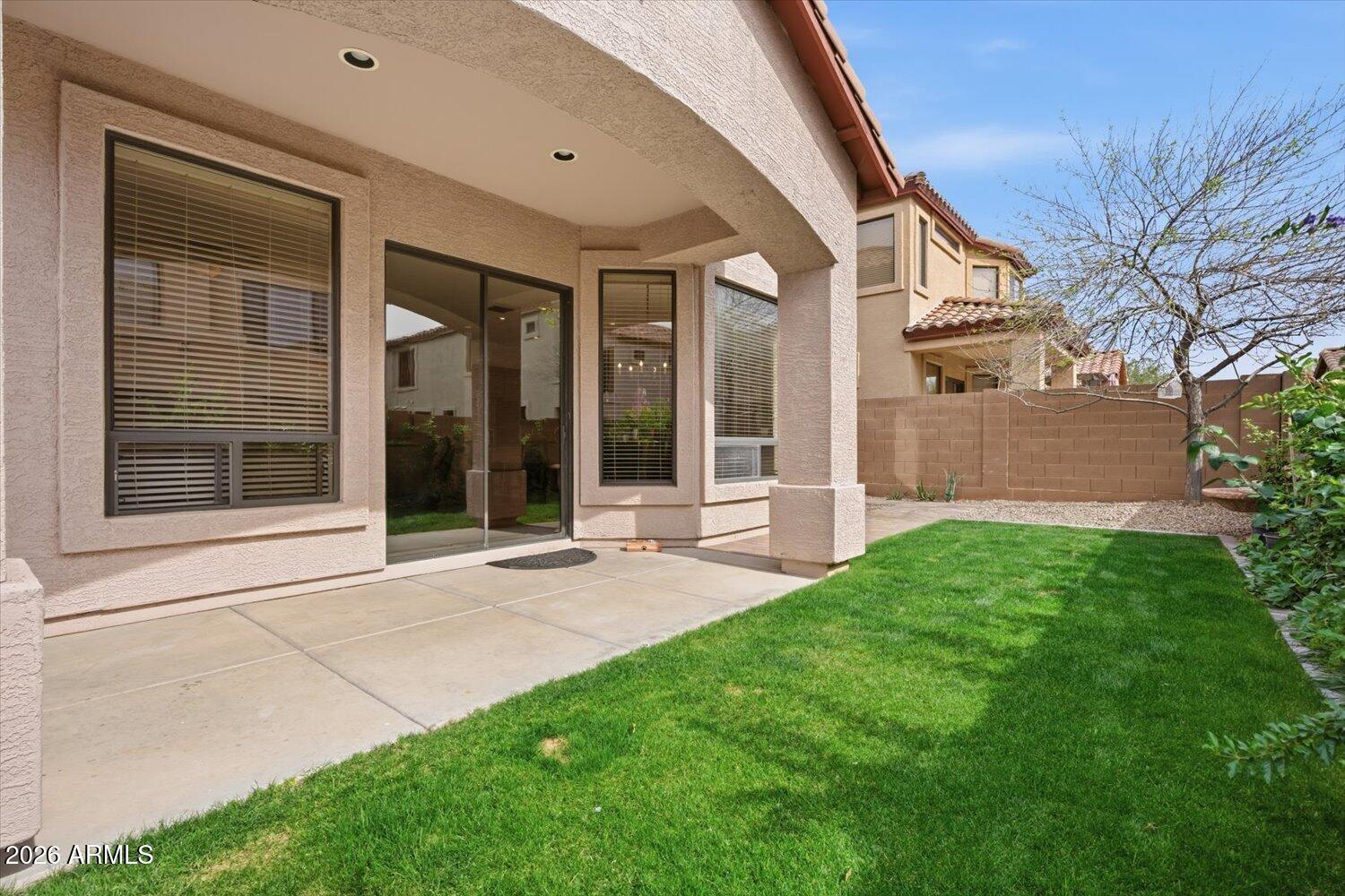 7253 East Nathan Street Mesa, AZ 85207 - Photo 24 of 34 a view of a house with backyard and porch