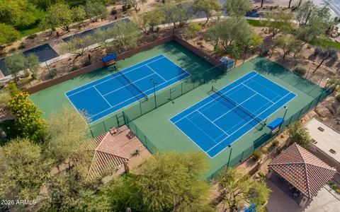 an aerial view of a house with a garden