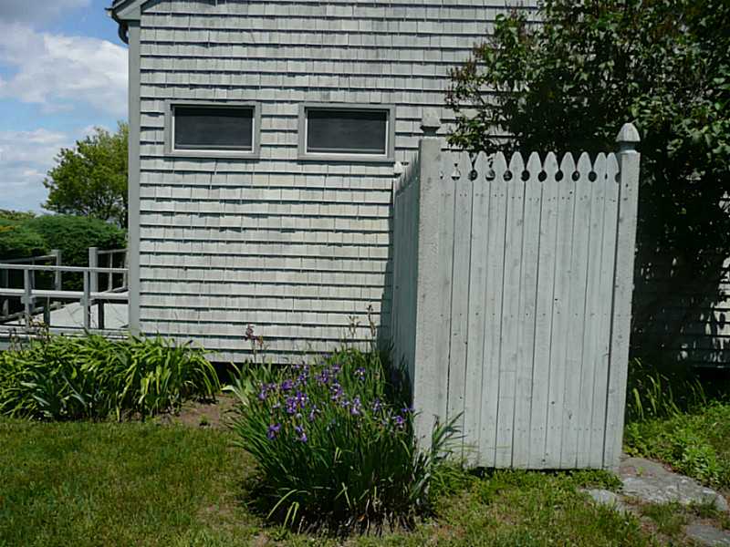 561 Puncatest Neck Road Tiverton, RI 02878 - Photo 14 of 25 Other. Beach cabana with bathroom outdoor shower.