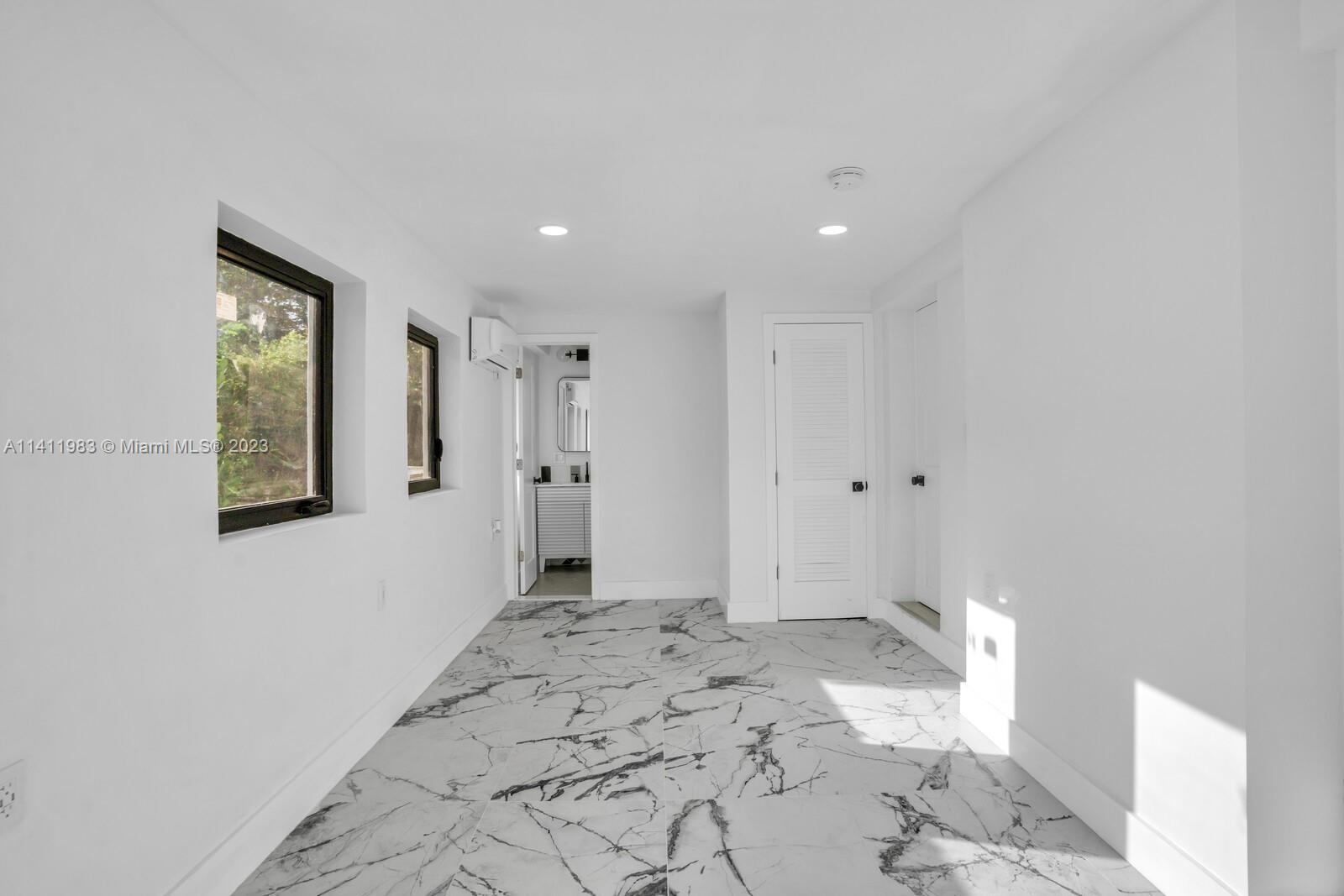 67 Northwest 109th Street Miami Shores, FL 33168 - Photo 22 of 30 Bedroom 1