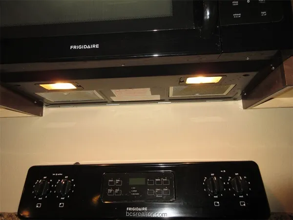 a view of a fence in front of a house